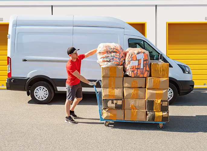 man delivering office equipment to storage unit in central il